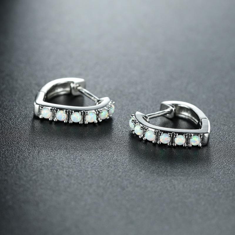

Wish fresh and sweet love inlaid with six blue opal ear buckles women s fashion versatile