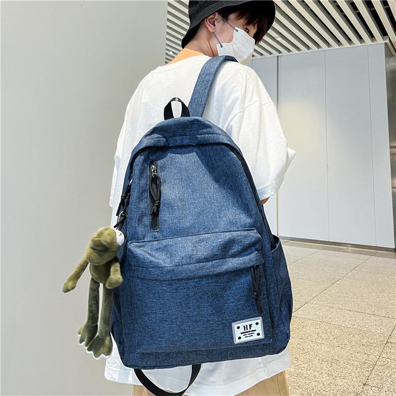 Schoolbag casual schoolbag men's canvas about backpack men's Korean version backpack large capacity middle school student schoolbag computer travel