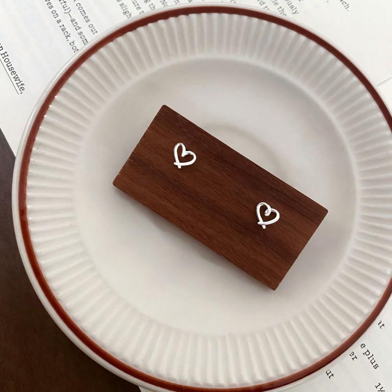 S999 Sterling Silver Hollow Heart Stud Earrings for Women - Korean Style, Sweet, Versatile Ear Cartilage Studs, and Basic Style Ear Care.