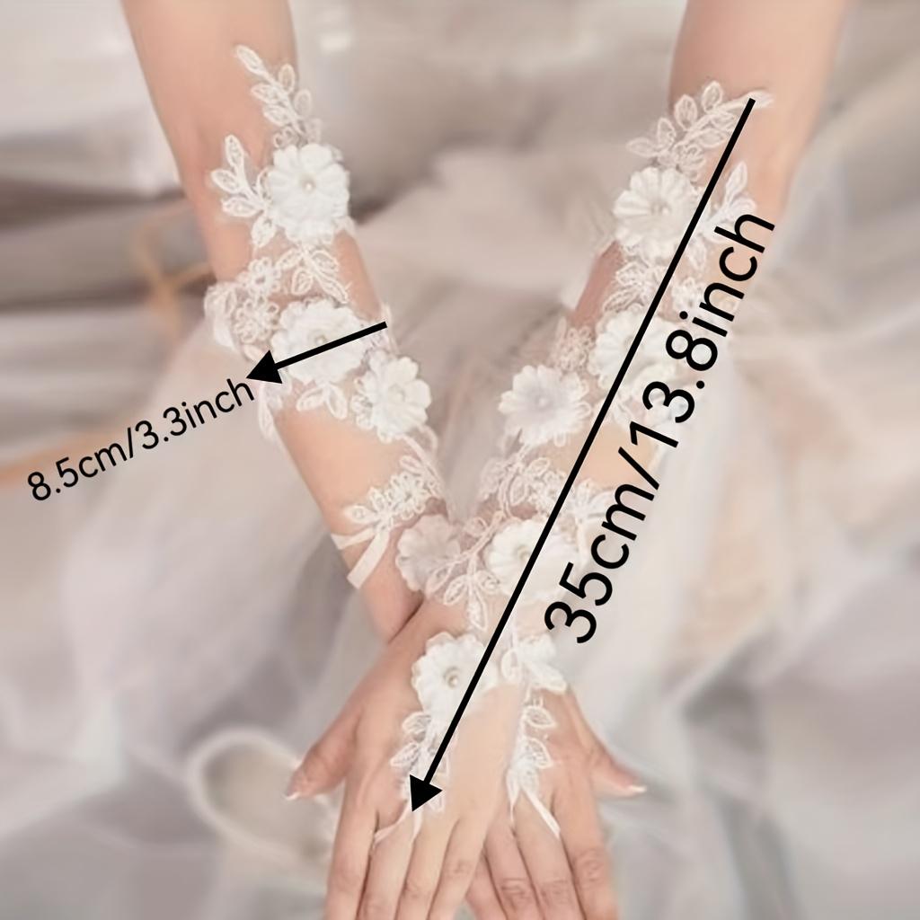 Elegante weiße Hochzeits-Handschuhe mit Blumen-Akzent Europäischer Stil Braut-Handschuhe Hohlfinger für vollständige Fingerabdeckung