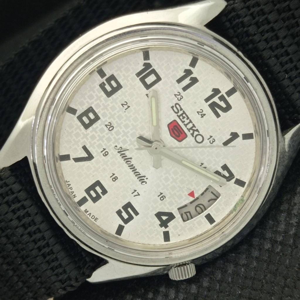 

Б/У винтажные мужские часы SEIKO 5 AUTOMATIC 7009A из Японии с серебряным механизмом и датой 593a-a311289-2 SKU593a-a311289