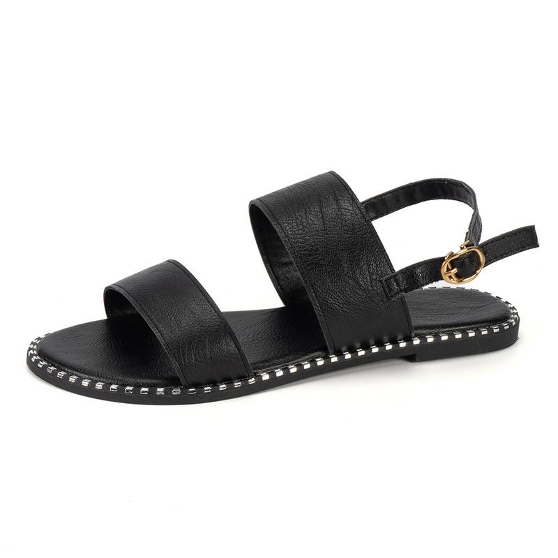 Flat-soled sandals women's summer new fashion shut-up one-word buckle strap solid color large-size sandals women