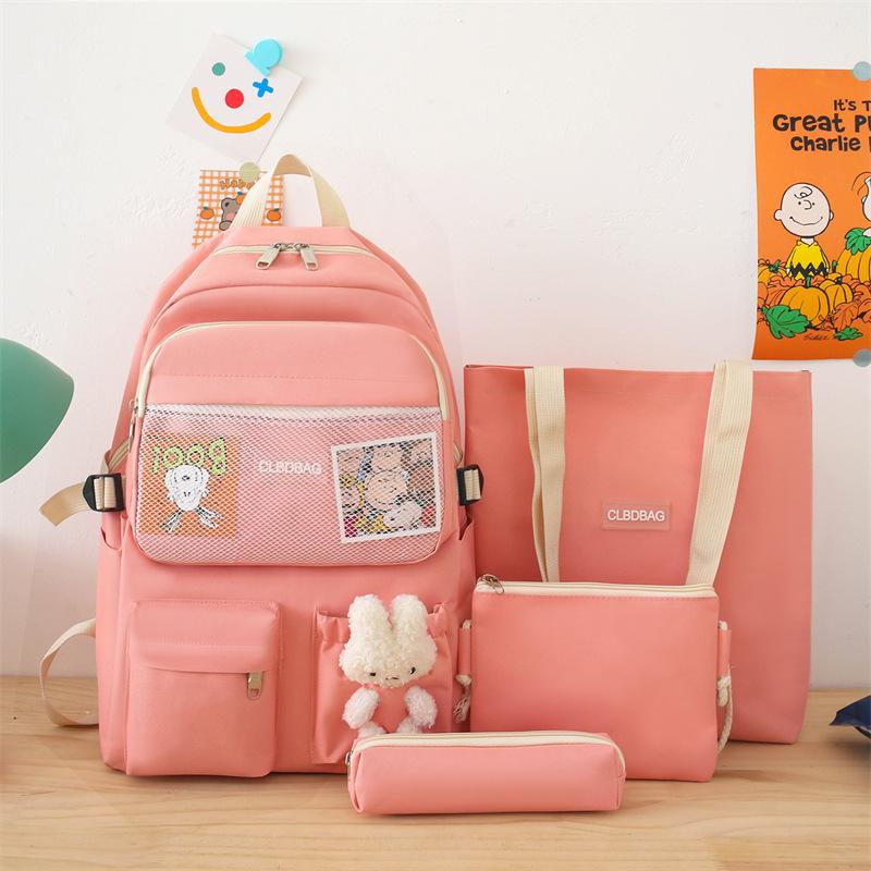 

School bag for women s new junior high school students large-capacity backpack, primary school students campus four-piece backpack розовый