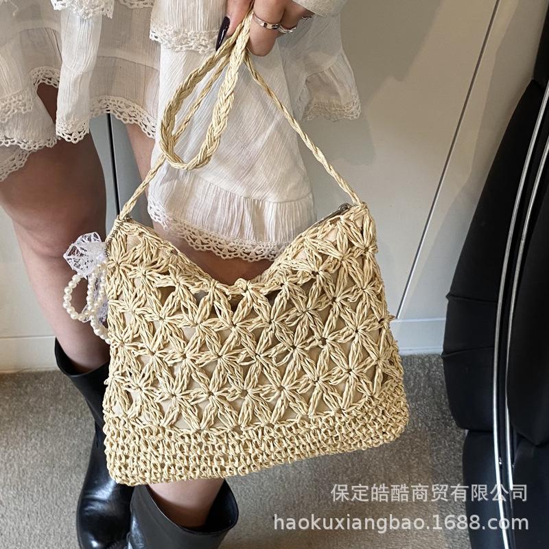 Summer seaside beach vacation straw bag women's 2025 new versatile messenger bag super fire mini bag bucket bag