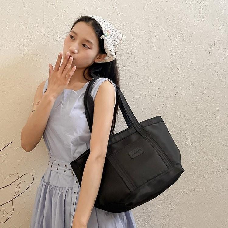 Spacious Nylon Canvas Tote Bag For Women Stylish Commuter Handheld Bag In Black And Cream