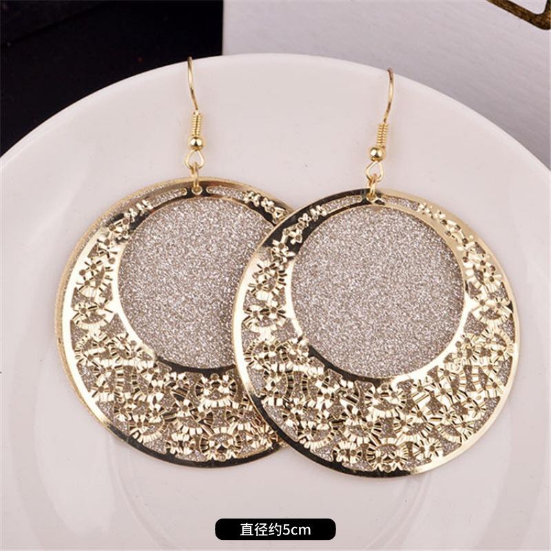 Fashion exaggerated niche temperament fringed earrings retro personality versatile sequined earrings women's long ear jewelry