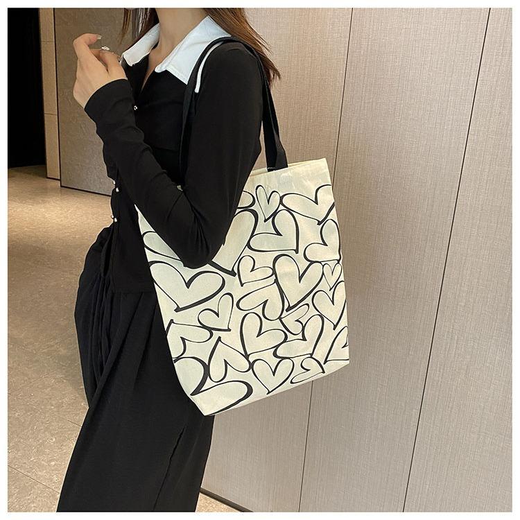 Canvas bag large capacity shoulder student tote bag cute variety of shopping bags simple cartoon canvas bag bag female