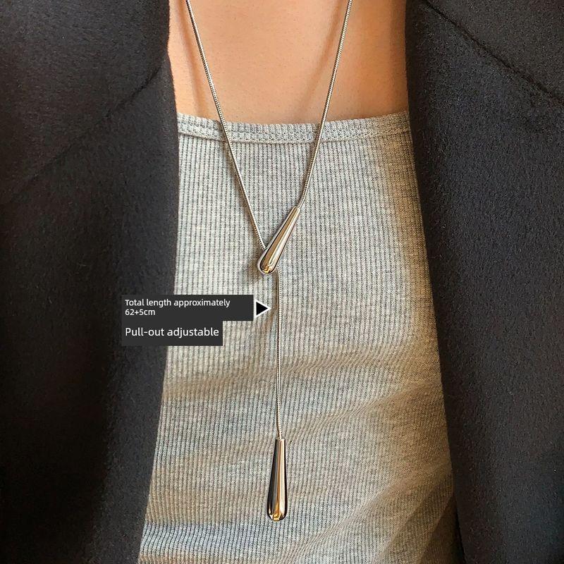 

Long Gold and Silver Color Adjustable Snake Bone Chain Water Drop Necklace Women s Accessory for Spring and Summer, High-End and Elegant Sweater Chain Silver