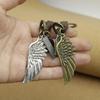 Men's Antique Bronze Wing Keychain with Woven Leather Pendant