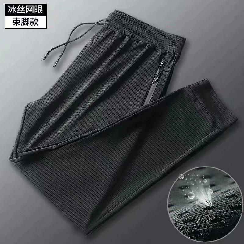 Air conditioning cloth mesh nine-point pants men's slim-fitting small feet closed feet hollowed out black trendy sports long pants