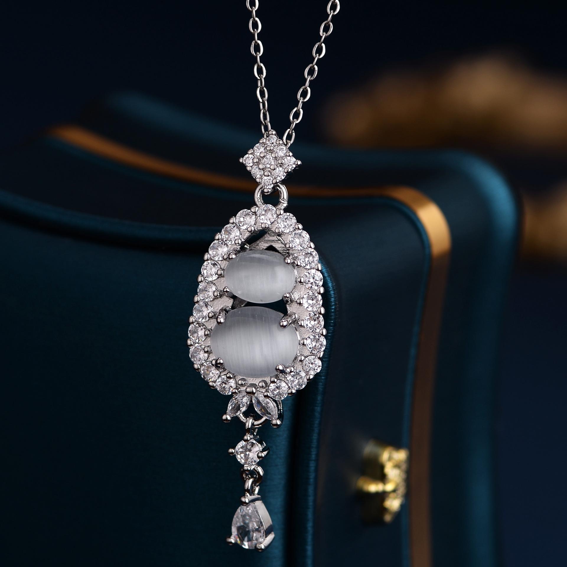 Elegant Tassel Cat s Eye Gourd Necklace for Women - Stylish Dan Mian Design with Niche Appeal