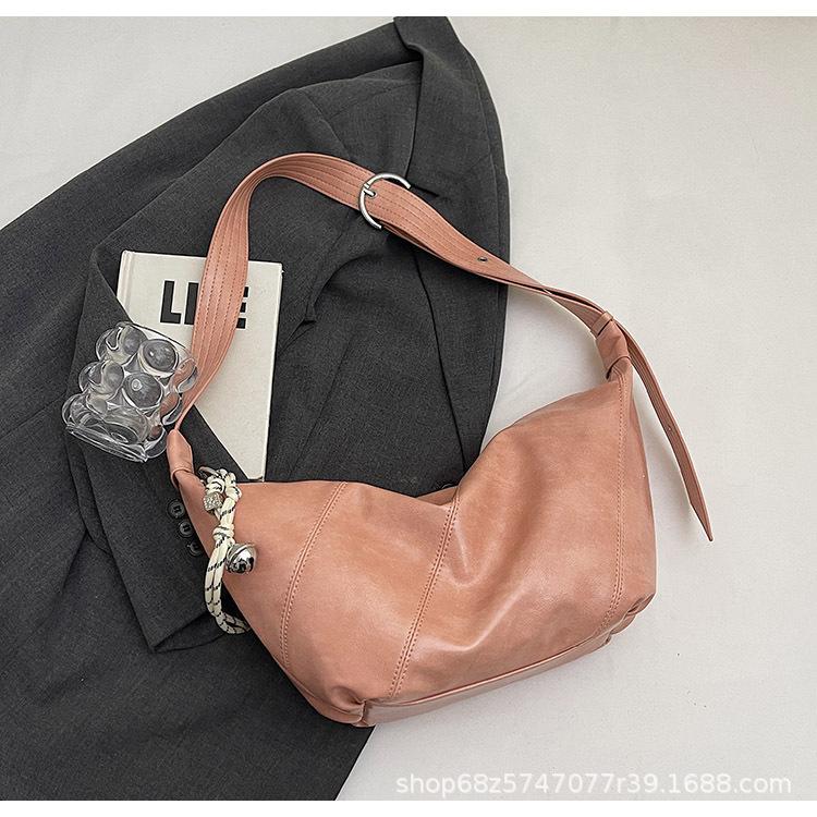 

Fashion large-capacity bag women s 2025 new retro versatile shoulder messenger bag casual Korean version commuter dumpling bag розовый