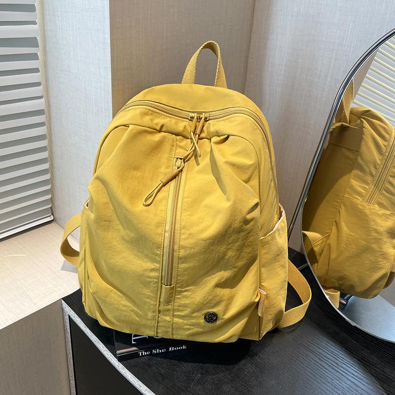 Schoolbag casual backpack female simple high school college student schoolbag Korean large capacity high sense travel backpack tide