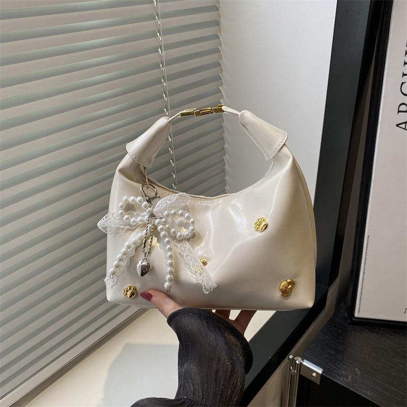 

Fashion hand-carried dumpling bag 2025 new niche simple shoulder messenger bag solid color bow personalized bucket bag Without pendant белый