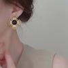 Elegant Retro French Light Luxury Hollow Four-Leaf Flower Earrings for Women
