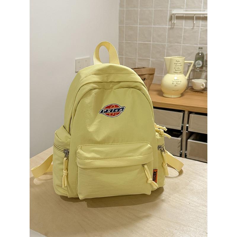 

Casual large-capacity backpack, new college student schoolbag, travel backpack, solid color.
