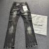 Jeans da uomo in denim elasticizzato nero con dettaglio ricamato, gamba leggermente svasata, vita media, stile casual streetwear