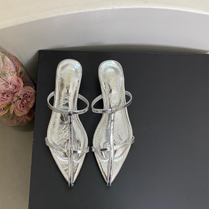 Evening wind silver thick-bottomed wedge cross slippers for women to wear 2025 new summer French holiday cool slippers
