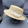 Natural grass flat top Lafite straw hat women's spring and summer sun protection sun hat seaside bucket hat grass woven hat