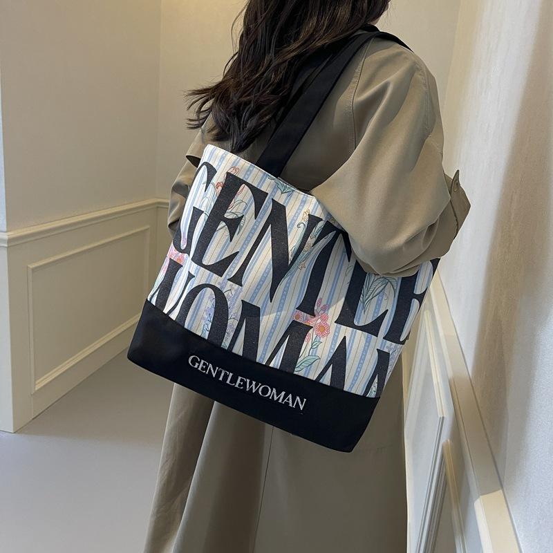 Large Capacity Alphabet Canvas Bag Women 2025 New Gentlewoman Fashion Printed Shoulder Bag Casual Bag