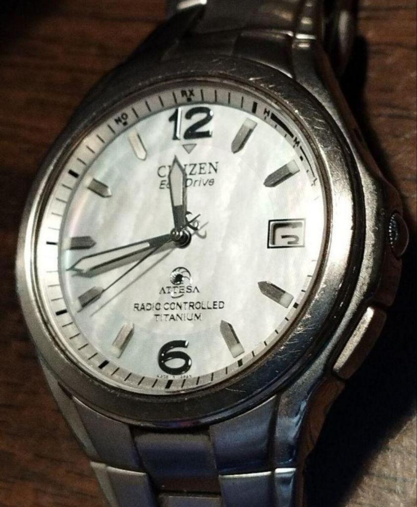 CITIZEN BQ41 Attesa Titanium Solar Watch with Date and Sapphire Crystal Radio-Controlled Display, Mother-of-Pearl Dial