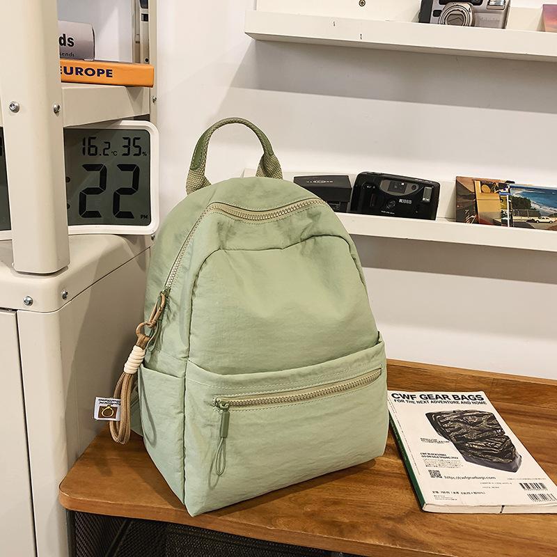 College style schoolbag female college student simple solid color large capacity commuter backpack lightweight versatile high school backpack