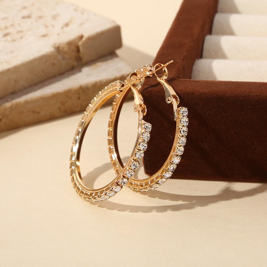 Korean Cold Style Luxury Diamond C-Shaped Earrings – Trendy and Elegant Design