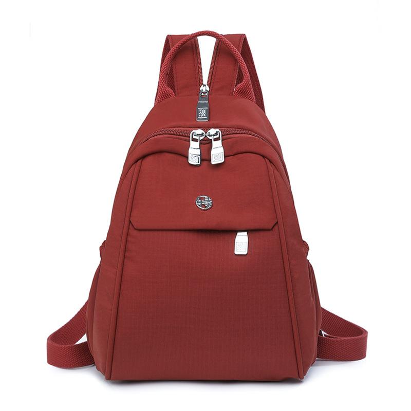 

Однотонный маленький рюкзак Женский рюкзак Большая вместимость Многофункциональная нагрудная сумка Легкая сумка через плечо красный