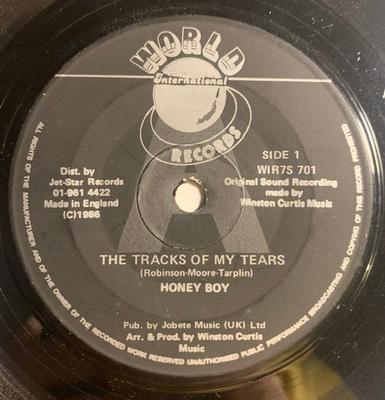 7inch Record HONEY BOY  The Tracks Of My Tears  Love Me Fo WIR7S701 World Internati 1986 UK Reggae Ska  Dub Used