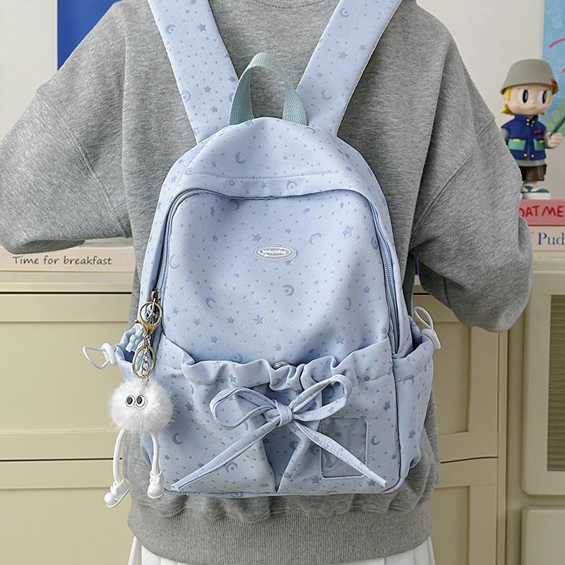 Schoolbag bow schoolbag female junior high school student star Korean version niche ins backpack college student computer bag micro pain bag