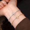 Französische einfache Zirkon-Kreuz-Auszieharmband leichte Luxus-Ohrringe exquisite personalisierte Schmuckstücke Damen