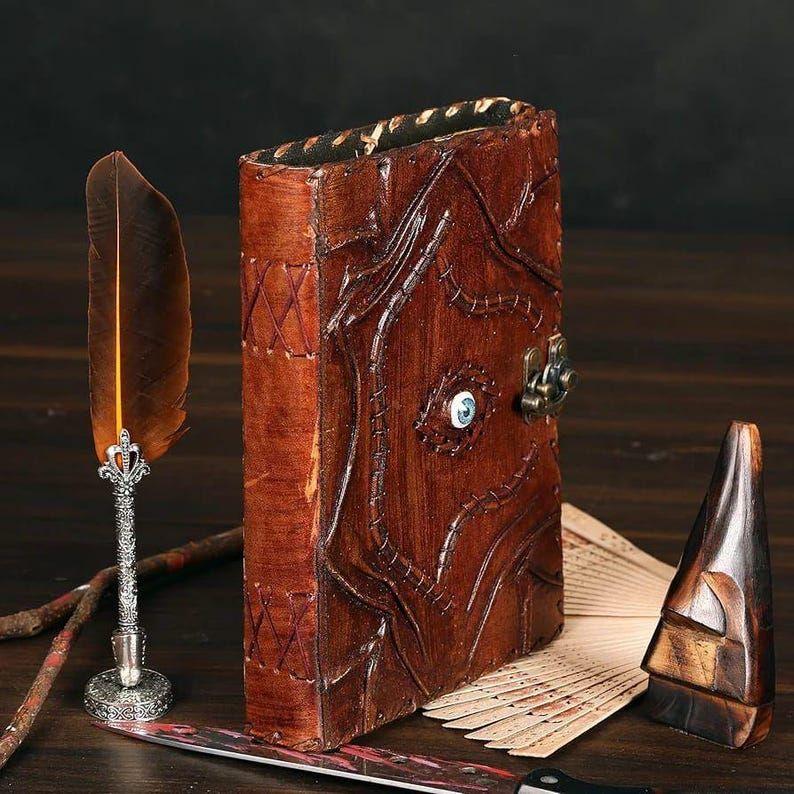 Leather Journal – Mystic Eye diary with embossed design, antique lock & unlined craft pages for writing or sketching.
