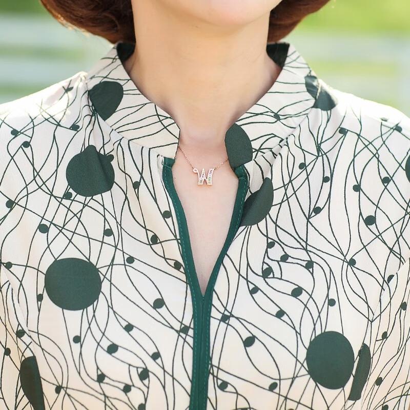 Robe d'été élégante à manches courtes et coupe évasée, à motif floral, pour femmes d'âge moyen