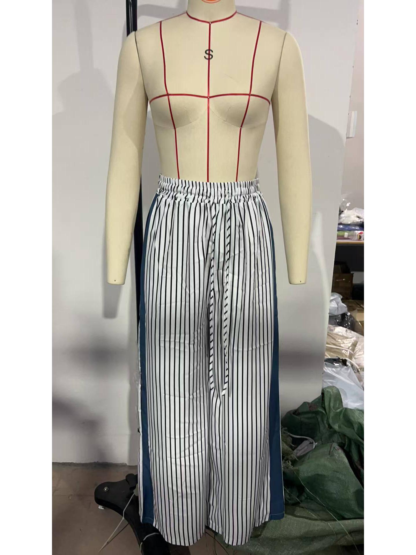 

Женские брюки широкие от бедра с леопардовым принтом и пэчворком M