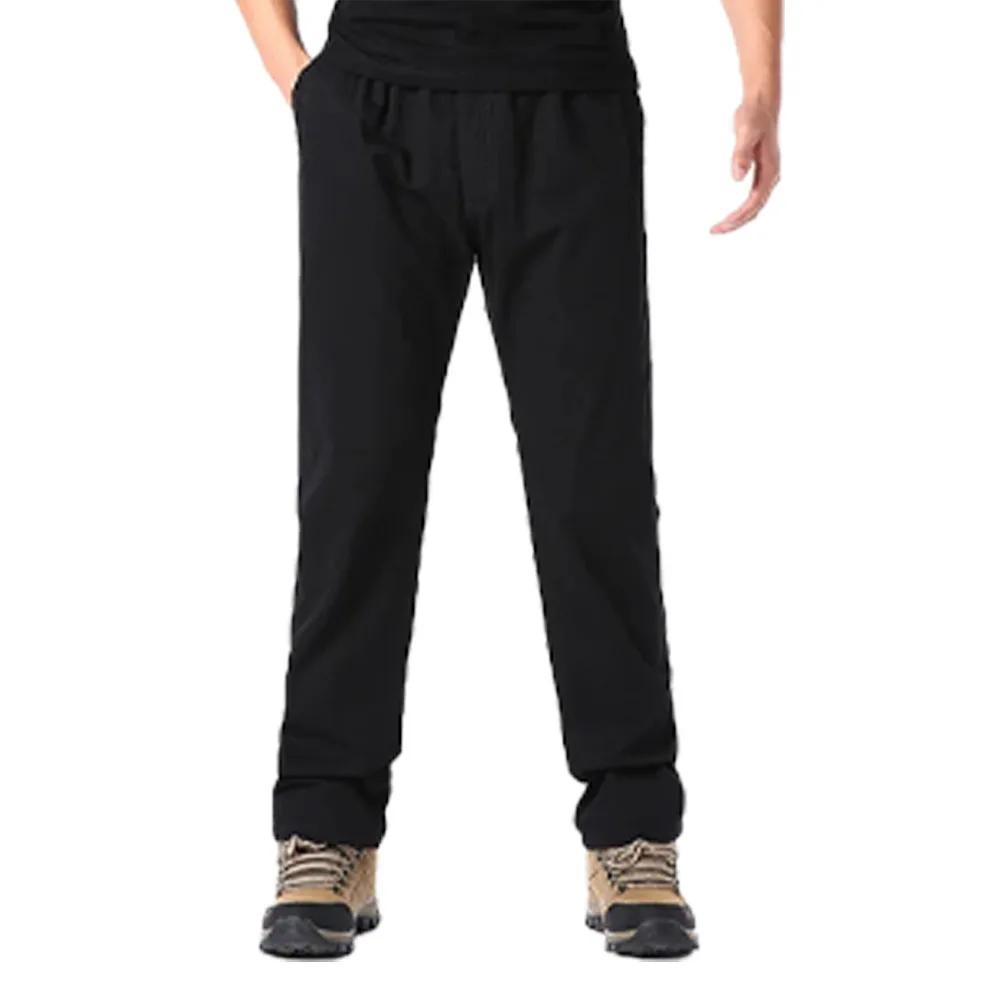 Wiosenne jesienne modne spodnie casualowe dla mężczyzn bawełniane spodnie cargo w jednolitym kolorze z elastyczną talią proste nogawki streetwear męskie spodnie joggers