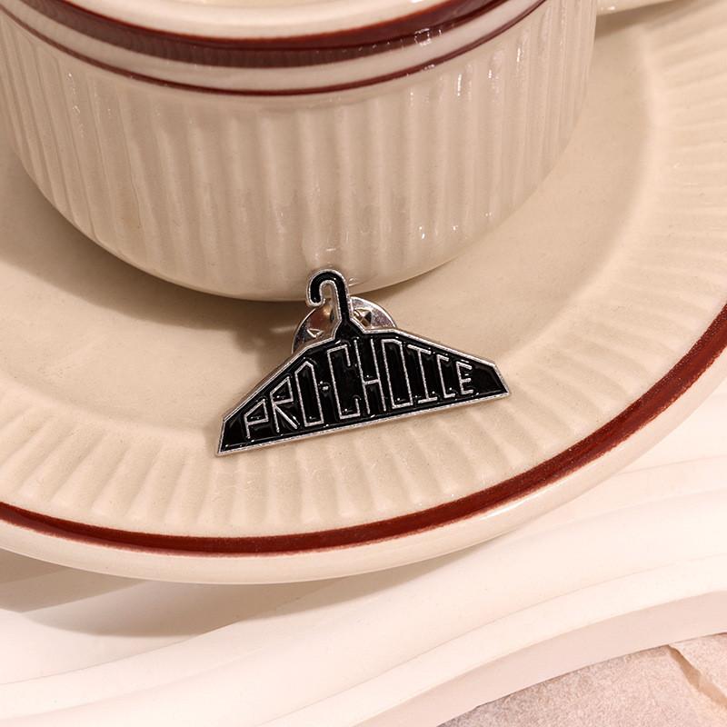 Unique Hanger Black Design Metal Brooch Pin Featuring Cute Cartoon Characters For Trendy Fashion