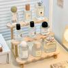 This 3-layer perfume storage rack is made of wood and is suitable for storing and displaying items