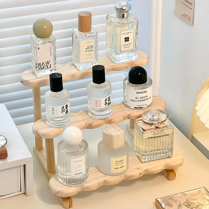 This 3-layer perfume storage rack is made of wood and is suitable for storing and displaying items