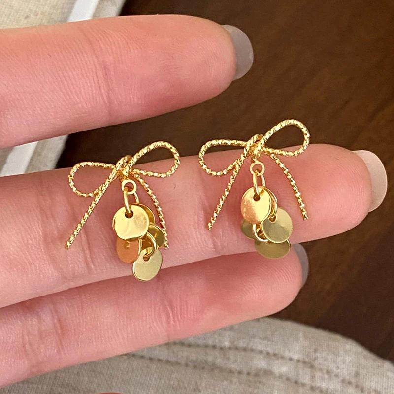 

Sweet Bow Sequin Metal Tassel Earrings for Women Light Luxury Niche Fashion Jewelry Personality Temperament Versatile Earrings