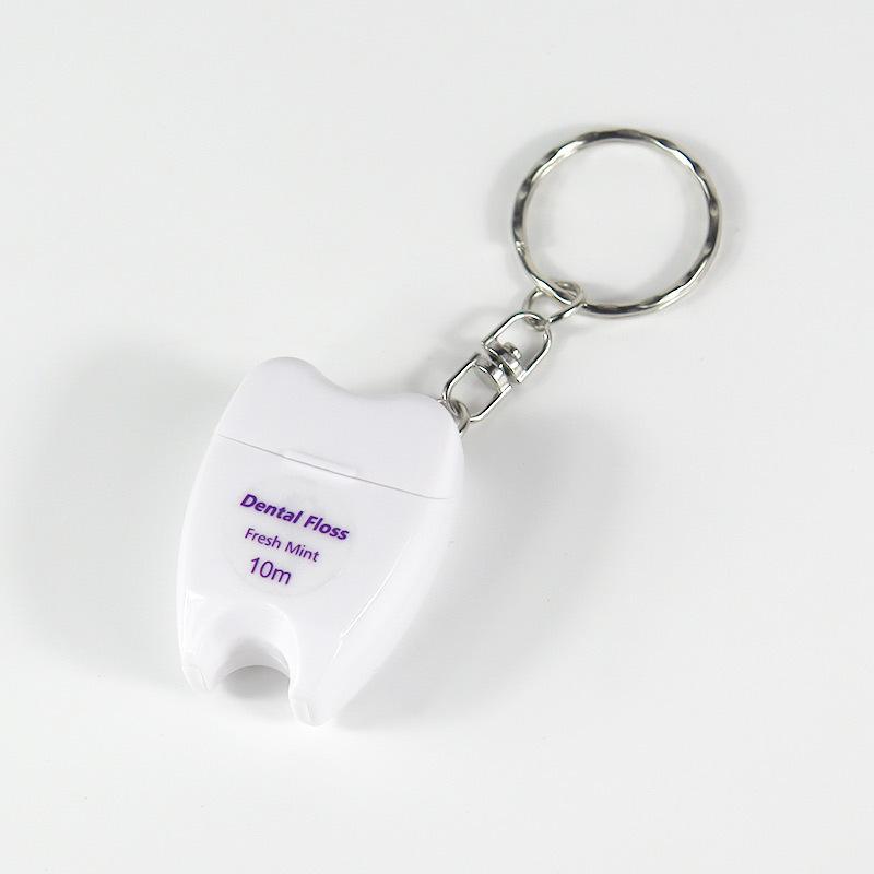 

Брелок для ключей из вощеной зубной нити мятного цвета с рулоном 10 м и индивидуальным дизайном логотипа белый
