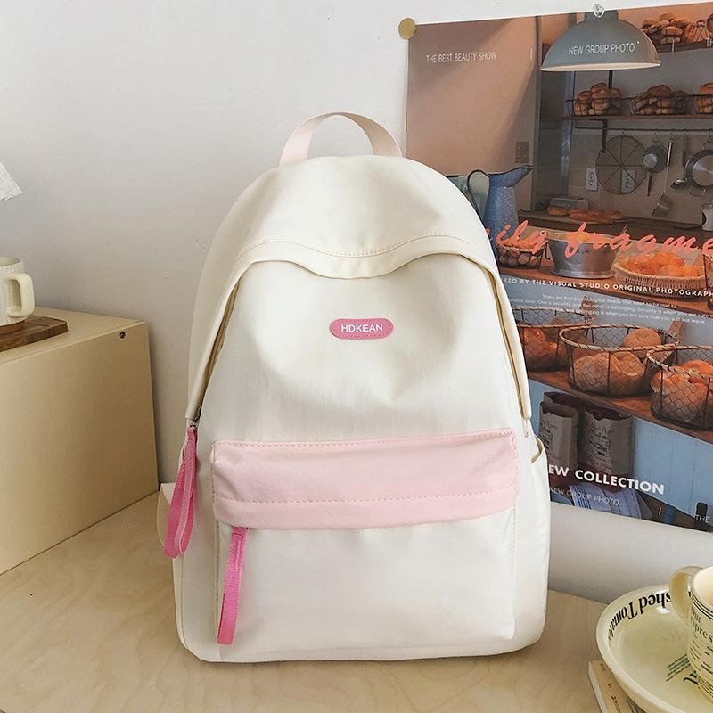 High value, fresh and sweet contrasting color backpack, light and multi-pocket backpack for primary and secondary school students