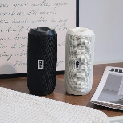 Portable Outdoor Bluetooth Speaker with Deep Bass, High Volume, Superior Sound Quality, and Long Battery Life for Cycling and Running.