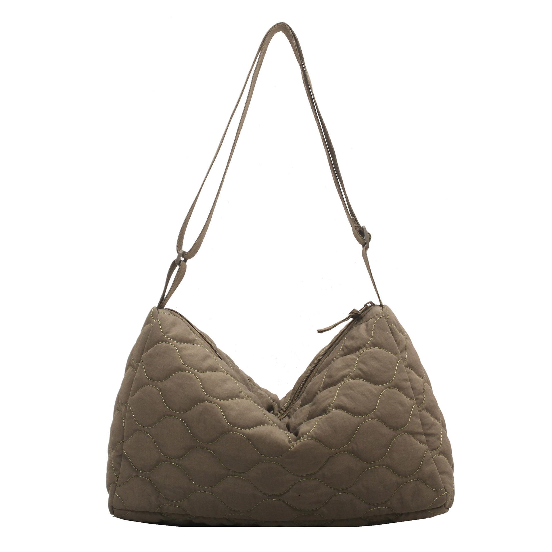 

Великі стьобані жіночі сумки через плече з якісної тканини. Сумка через плече з вишивкою нитками. Великі модні жіночі сумки. зелений