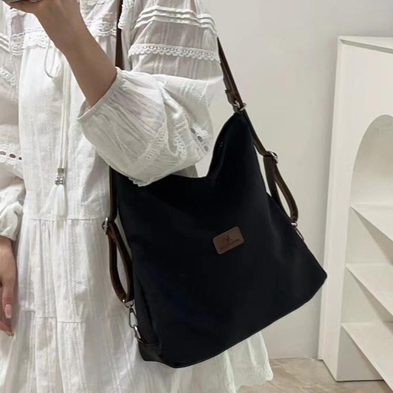 Große Kapazität Modische Canvas-Umhängetasche Damen Freizeit Literatur und Kunst Einfacher einfarbiger Umhängerucksack