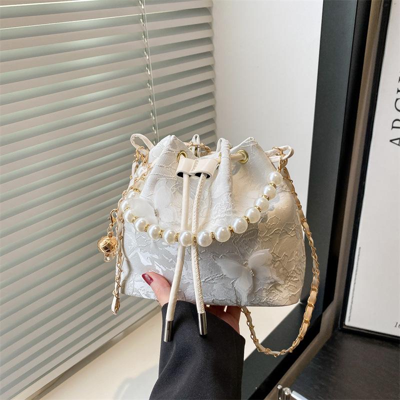 

Женская роскошная сумка-ведро с жемчужным декором - минималистичная сумка через плечо с художественной вышивкой, уникальный шик на каждый день розовый