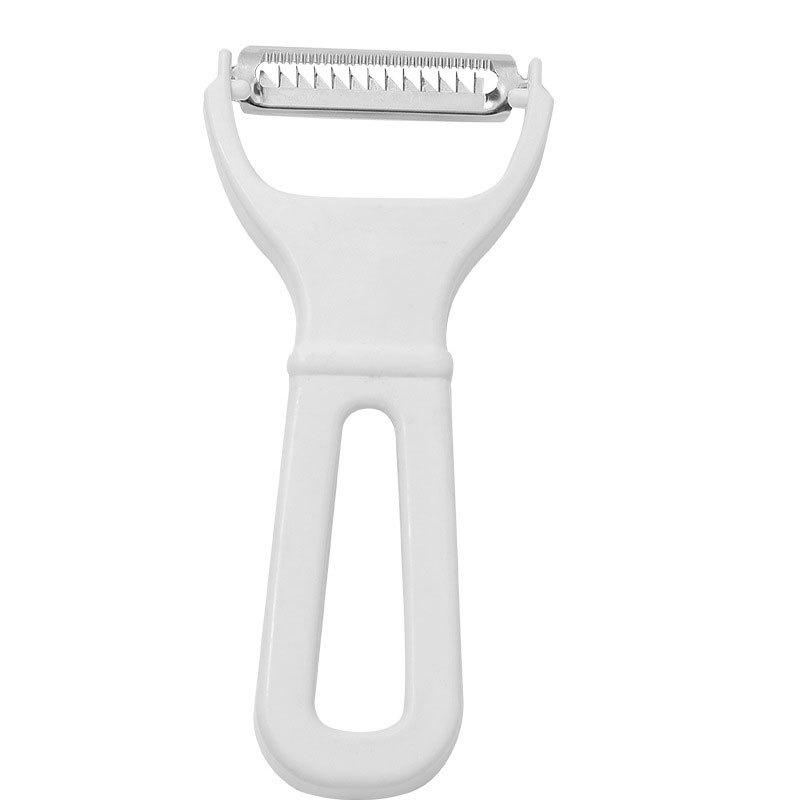 Škrabka a kráječ, kuchyňský nástroj na loupání a krájení ovoce a zeleniny. Šetří námahu a lze jej použít k zavěšení kráječe