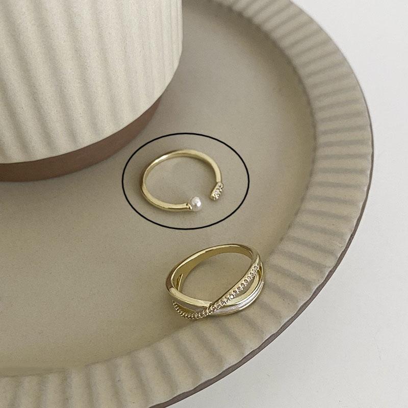 

Open Contemporary Minimalist Ring Featuring Vintage Pearl And Shimmering Zirconia J3351