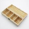 Multi-Compartment Wooden Tea and Gift Box with Four Sections for Storage.