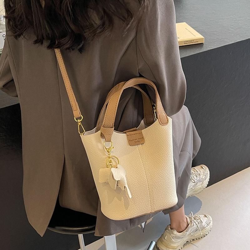 Damen PU-Leder Eimer Tasche Modisch Französisch Nische Designer Große Kapazität Vielseitig Pendler Crossbody Tasche Reise Tragetasche