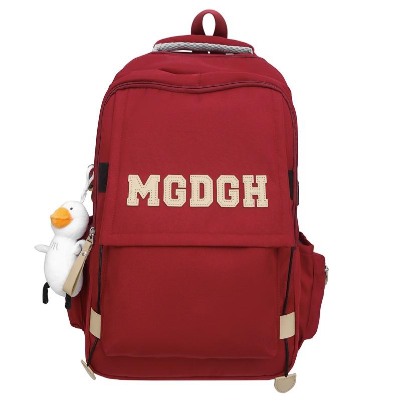 Schoolbag Japanese new solid color simple campus junior high school schoolbag Korean version girl backpack women's large capacity travel backpack